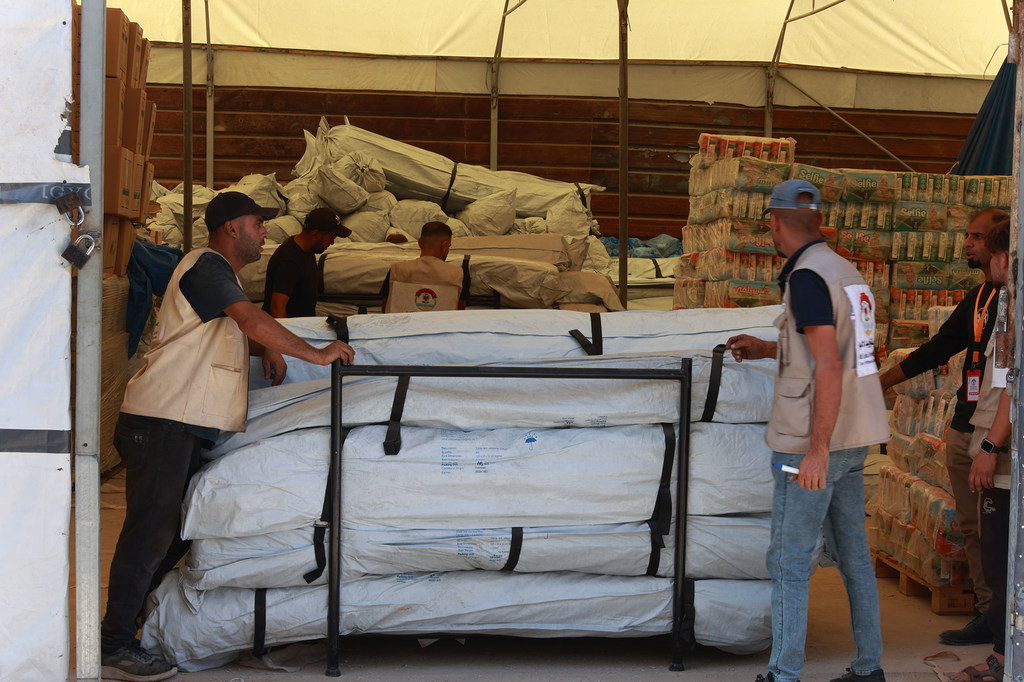 UN partner BLDA distributes tents to Gaza families after the ceasefire began on 10 October. The enclave remains in the grip of a catastrophic humanitarian emergency..